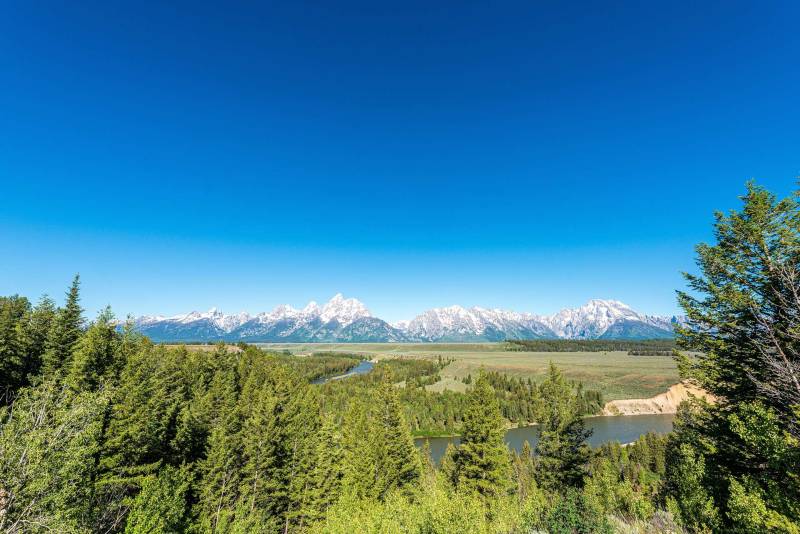 A panorama of the Grand Tetons range, as seen from one of the Jackson Hole float trips