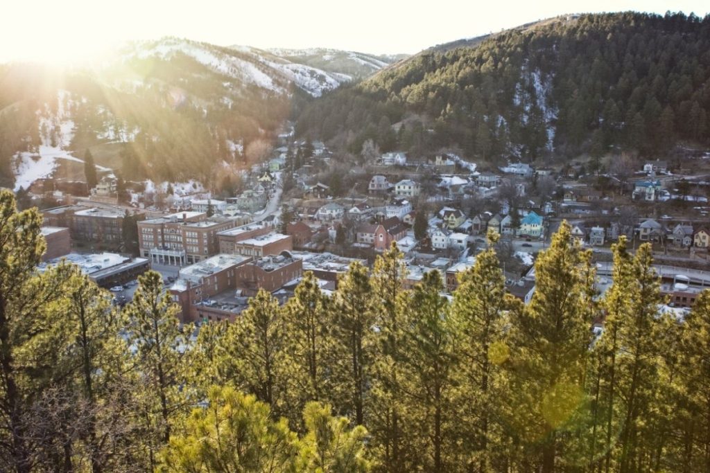 An aerial view of historic Deadwood, South Dakota, on a snowy day