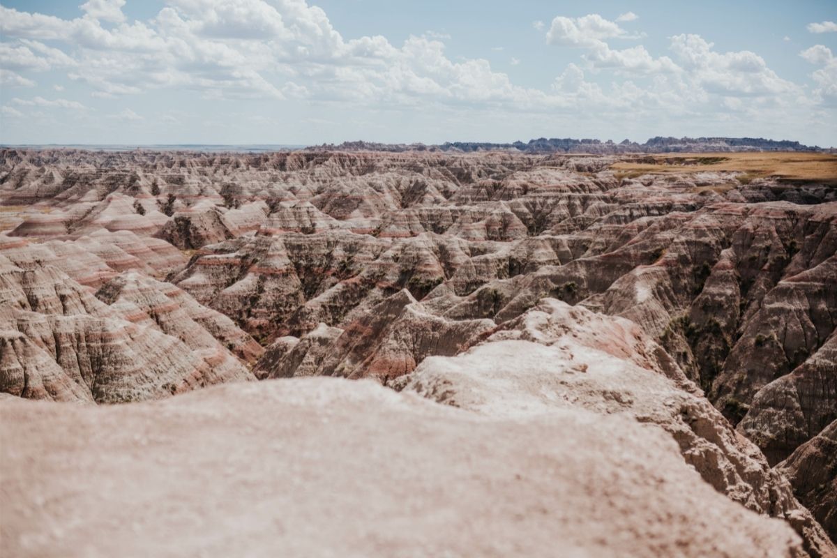 A well-beaten ridge among colorful formations on one of the many hikes in Badlands National Park