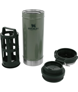 A green Stanley Classic Travel French press and its components for making camping coffee