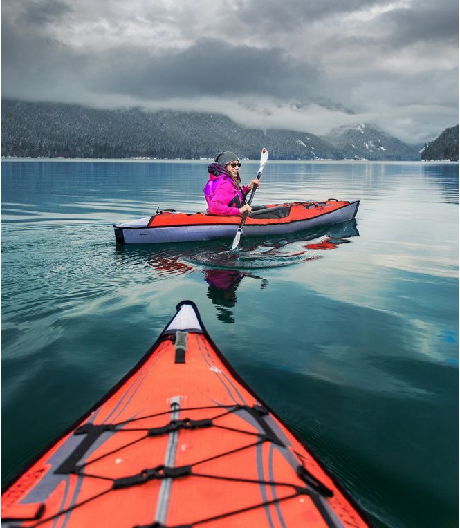 Two Advanced Elements Advanced Frame kayaks on a lake