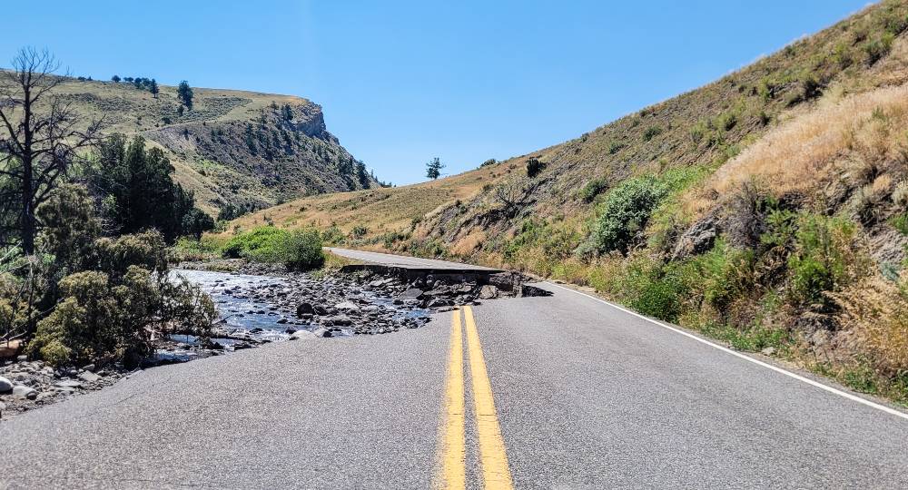 A section of damaged road just beyond the north entrance to Yellowstone National Park