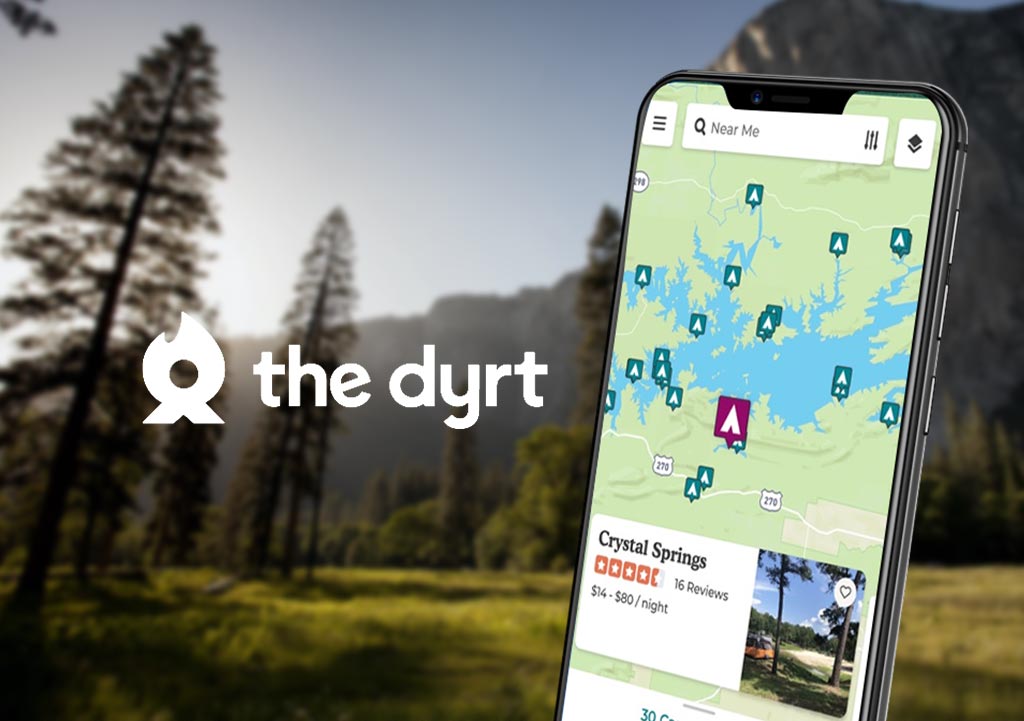 A phone showing the interface of The Dyrt camping app, one of the the best camping apps