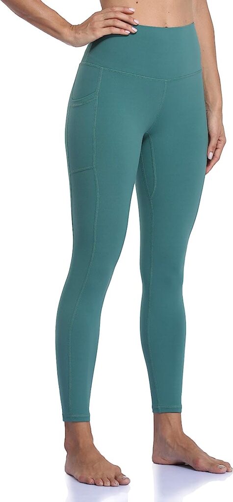 A woman wearing a green pair of Colorfulkoala leggings, some of the cheapest hiking tights available