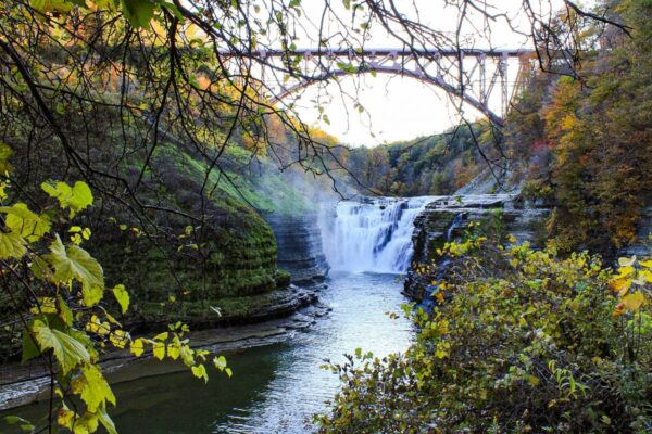 The iconic trestle bridge over a waterfall in Letchworth Gorge State Park in New York