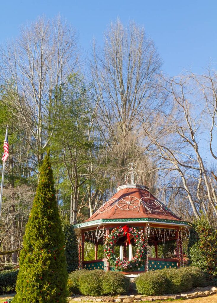 A gazebo in a park with festive decorations for Christmas in Helen GA