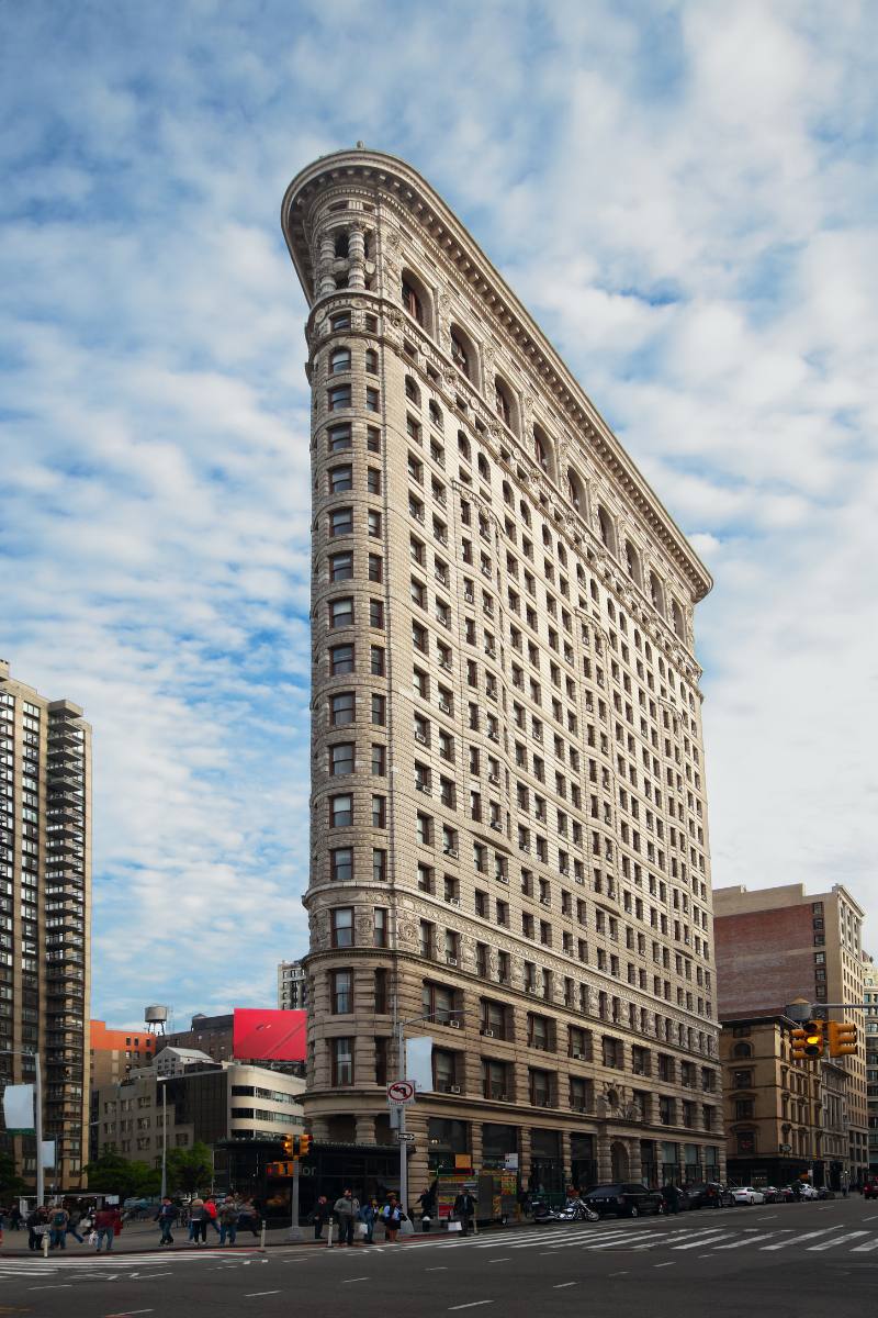 The Flatiron building on a sunny but cloudy day in New York City