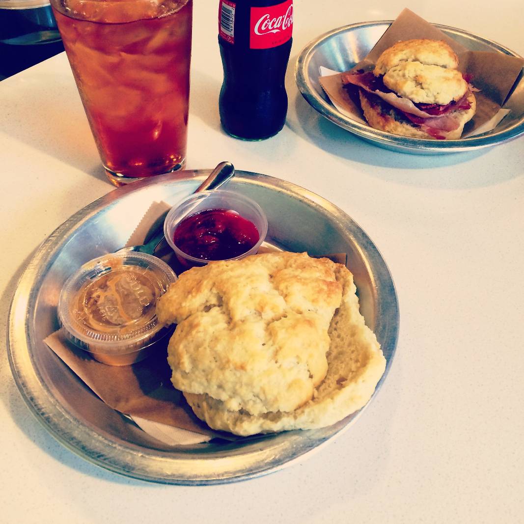 Two biscuits and two drinks on a table at Jubala, a popular coffee shop in Raleigh NC