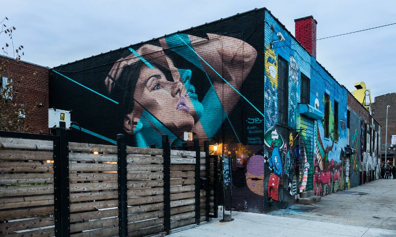 A mural covering an entire wall in the Bushwick Collective in Brooklyn