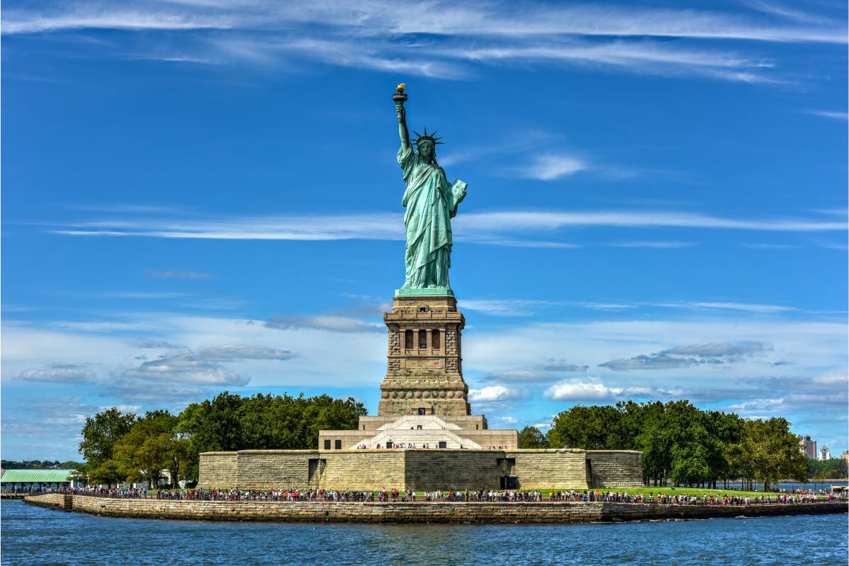 The Statue of Liberty on Liberty Island, both bucket list things to do in New York City