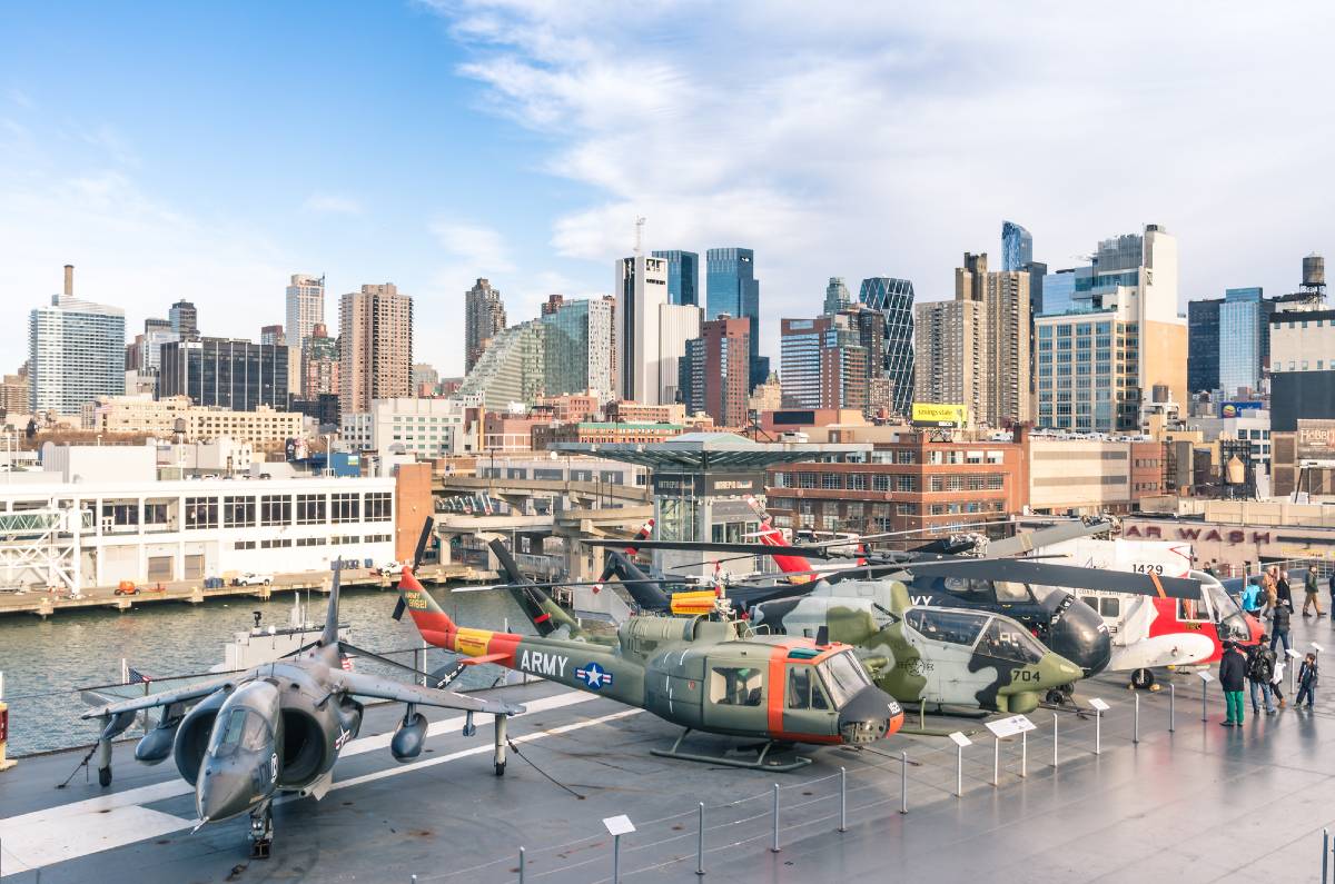 Looking across a deck of the USS Intrepid to the skyline, a view worthy of being on any NYC bucket list