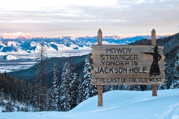 The Yonder is Jackson Hole sign in Wyoming near the Grand Tetons on a winter day